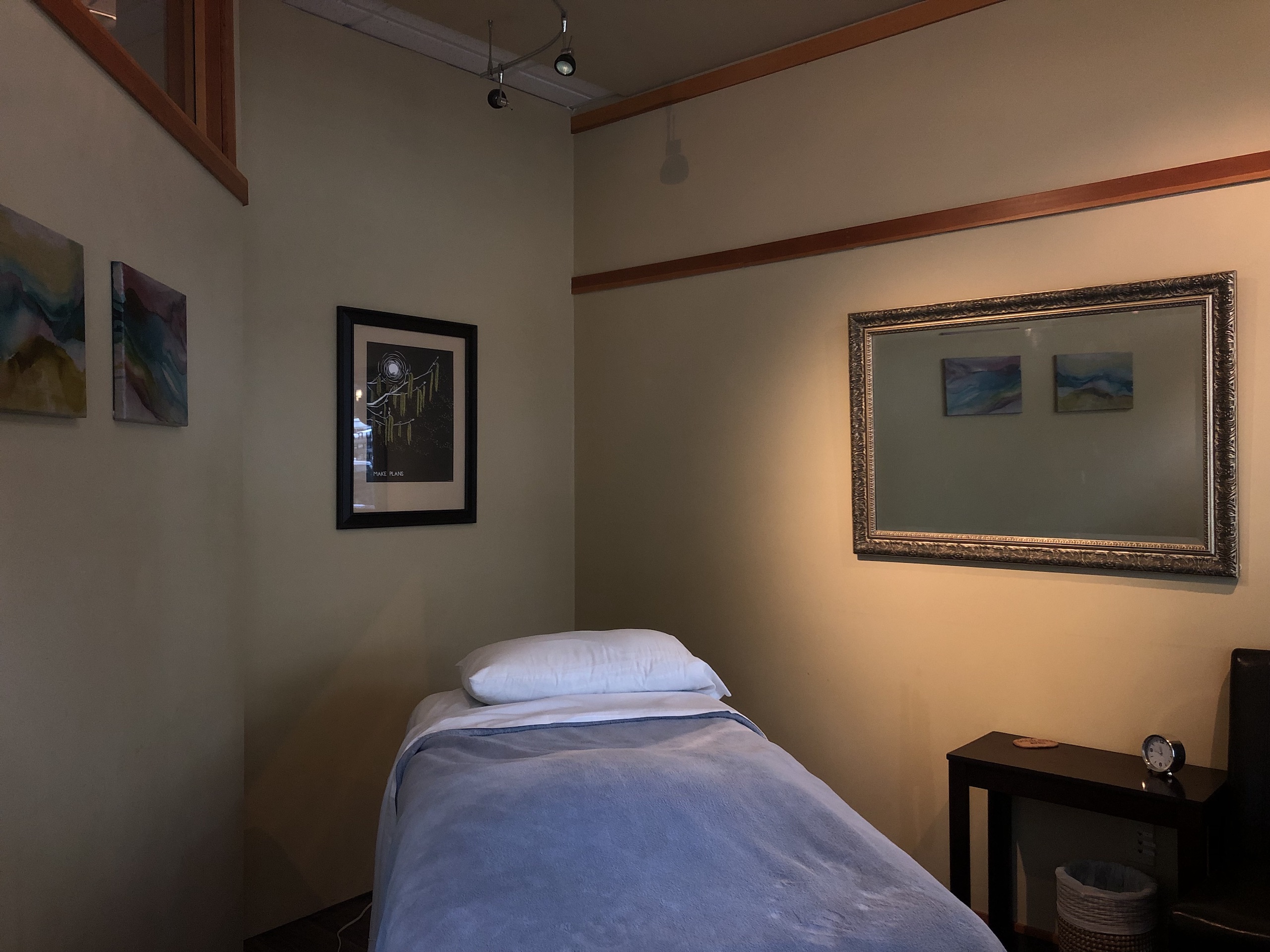 Long view of massage room with table